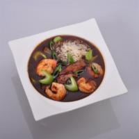 Gumbo · Stewed shrimp and vegetables over rice.