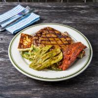 Bistec a la Tampiquena · Tampico style steak. Served with Mexican sausage, onions, jalapeno, rice, beans and tortilla...