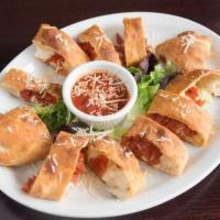 Pepperoni Rolls · Pepperoni, pizza sauce and Parmesan cheese rolled up in strips of our famous pizza dough and...