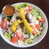 Greek Salad · Tomatoes, cucumbers, red onions, green peppers, feta cheese and Greek olives with house Ital...