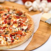 Pizza al Prosciutto · Olive oil glaze with mushrooms, prosciutto ham, tomatoes, goat cheese, roasted peppers, fres...