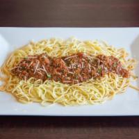 Spaghetti · In house-made marinara or meat sauce. Served with garlic bread.
