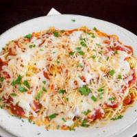 Baked Spaghetti · Spaghetti, mozzarella, Parmigiana and choice of marinara or meat sauce. Served with garlic b...