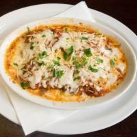 Lasagna · Pasta layered with house-made bolognese sauce, ricotta, provolone, Romano, Parmesan and mozz...