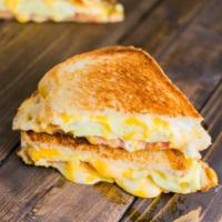 Grilled Cheese & Eggs Sandwich  · Choose your favorites from add-ons. 