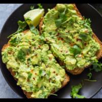 The Avocado Toast Open Face (half mashed avocado on toasted slice bread of your choice) · Simply Smash avocado two slices open face. Add-ons extra.