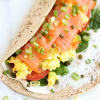 Nova Smoked Salmon Breakfast Sandwich(smoked salmon, eggs, cream cheese, green onions, spinach, tomatoes) · Nova Smoked Salmon, eggs,green onions, cream cheese, tomatoes,spinach. Add-ons extra 