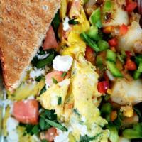 Greek Omelet Platter (eggs feta cheese onions spinach olives & Tomatoes) · Eggs, feta cheese, spinach,olives,onion and tomato. Includes your choice of home fries or ha...
