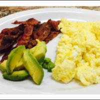 Eggs Bacon & Half Avocado On Plate With  Side Toast  · Eggs bacon avocado. Add-ons extra. 