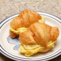 Eggs Croissant Sandwich (choose your Add-ons) · Eggs and cheese croissant. Add-ons extra 