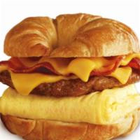 Eggs Sausage & Bacon And Cheese Breakfast Croissant  · Eggs Sausage and bacon with cheese on croissant. Add-ons extra. 