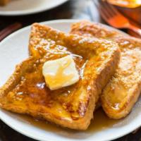 French Toast (choose your favorite eggs, meats,fruits,etc. from add-ons) · Two Jumbo  French Toast served with butter and syrup. Add-ons extra. 