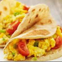 Eggs Green Onions Tomatoes Tacos  · Choose your favorite side Dressing. Salsa Verde, mild salsa. Add-ons extra. 