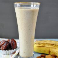 Oasis Breeze Smoothie (banana, dates,cinnamon, almond butter, almond milk) · Dates,banana, cinnamon, almond butter, almond milk.