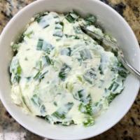 Side Scallion Cream Cheese  · 4 oz. Container scallion cream cheese 