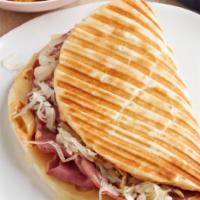 Reuben Panini (corned beef or pastrami swiss coleslaw & russian dressing) · Pastrami or Corned beef, swiss, Coleslaw, Russian dressing. Add-ons extra. 