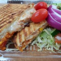 Chicken Fajita Panini (grilled chicken Vermont cheddar roasted peppers caramelized onions & salsa) · Grilled chicken, cheddar cheese, roasted peppers, caramelized onions and salsa. A hot grille...
