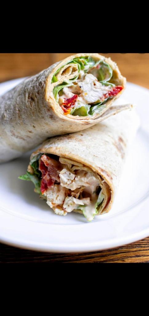 Classic Chicken Salad And  Bacon Wrap (chicken salad bacon lettuce tomatoes) · Chicken Salad, strips crispy bacon, lettuce, tomatoes, choose your favorite dressing.Add-ons extra. 