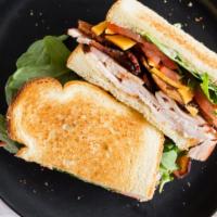 Boar's Head Honey Glazed Turkey Bacon & Cheese Combo Sandwich  · Boar's Head Honey Glazed turkey and bacon cheese lettuce tomatoes combination sandwich. 