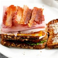 America's Gourmet Triple Club Special Combo Sandwich (bacon, ham & turkey) · Boar's Head Turkey, Ham, Bacon & 