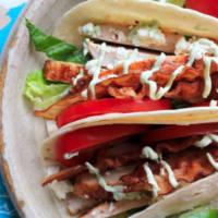 Ranch BLT Tacos (grilled chicken, bacon, lettuce, tomatoes, ranch dressing on soft corn taco) · Grilled chicken, bacon lettuce & tomatoes & Ranch Dressing. Choose your favorite dressing. A...