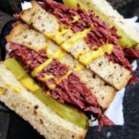 New York Style Pastrami Sandwich (pastrami on rye with pickles & mustard) · Boar's Head Pastrami on rye bread with mustard and pickles. 