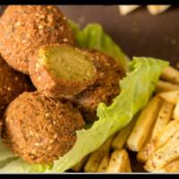  Falafel And Fries Or Potato Wedges  · 4 Pieces falafel and french fries or potato wedges. Choose your favorite dressing. 