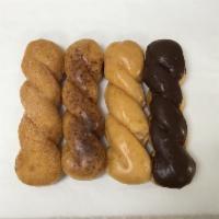 Twist Donut · Comes with choice of glazed, chocolate, cinnamon sugar, cinnamon glazed.