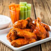 Buffalo Wings · A fresh batch of chicken wings topped with Buffalo sauce.
