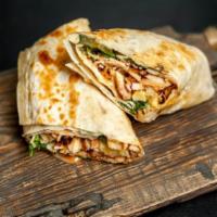 Cajun Chicken Burrito · Our signature burrito served with grilled chicken, beans, rice, pico de gallo, melted cheese...