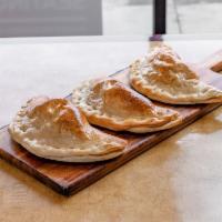Calzone Specialty · Comes with mozzarella and ricotta.