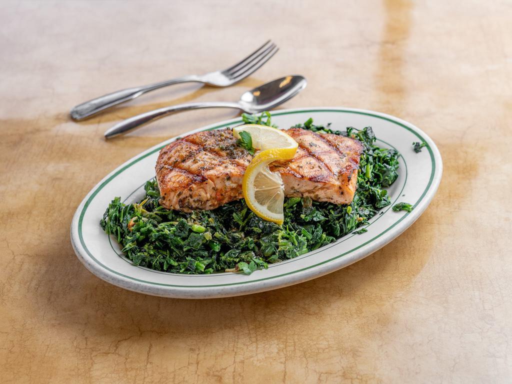 Grilled Salmon · Comes with over sauteed spinach.