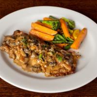 Veal Porcini · Veal scallopini sauteed with shallots and porcini mushrooms in a brandy cream sauce. Served ...