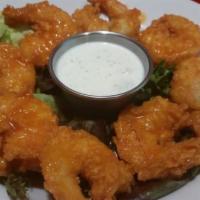 Buffalo Shrimp · A quarter pound of hand breaded shrimp tossed in our tangy buffalo sauce served with ranch o...