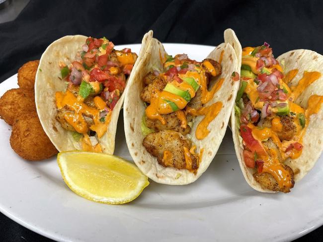 Galway Bay Fish Tacos · Blackened whitefish, avocado, pico de gallo & lettuce served in flour tortillas with our tangy chipotle sauce and potato croquettes.