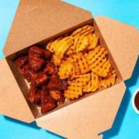 Boneless Wings (8 Pieces - 2 Flavors) · Wings tossed with your choice of flavors and served with your choice of fries, waffle fries ...
