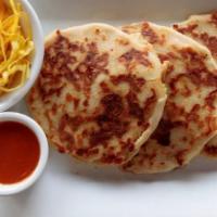 Revueltas Pupusas · Mixed. Chicharron y queso. Fried pork and cheese.
