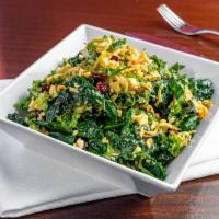 Carroll Gardens Winter Salad · Shaved cabbage and lacinato kale with grated cauliflower, shredded carrots, dried cranberrie...