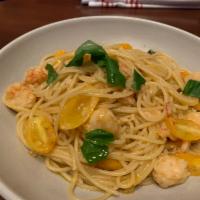 Spaghetti and Lobster  · Spaghetti, Lobster, white Wine Butter Chile Sauce with Cherry Tomatoes