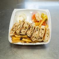 Chicken Shawarma Arabi and Fries · Thinly sliced roasted meat.