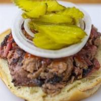 Chopped Brisket Sandwich · Our brisket sandwich comes from our top of the line smoked brisket meat. Large in size and w...