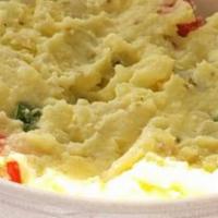 Potato Salad · Creamy mustard and mayo-based potato salad, with chopped red peppers and other spices. Surpr...