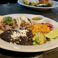 Meat Taco Combo ·  Two homemade corn tortilla tacos filled with your choice of meat. Served with rice and bean...