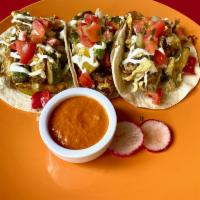  Single Veggie Taco  ·  Our homemade corn tortilla taco filled with mixed veggies (bell peppers, mushrooms, asparag...