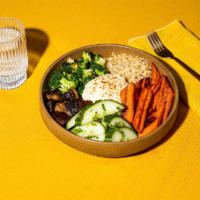 Something Hearty · Long grain brown rice, roasted garlic mushrooms, spiced roasted carrots, cucumbers, house-ma...