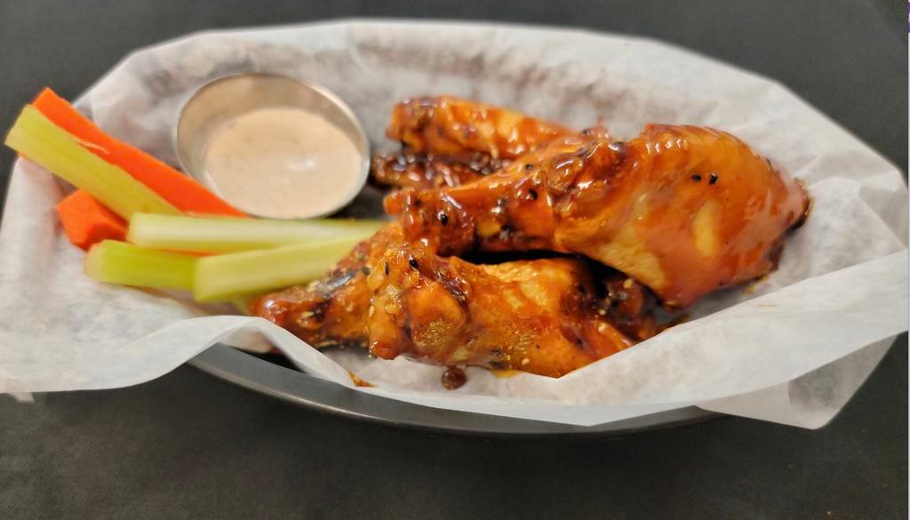 Twice Fried Chicken Wings  · Crispy chicken wings tossed with your choice of sauce (BBQ, Buffalo, or teriyaki). Served with a side of Rock Creek ranch dressing.