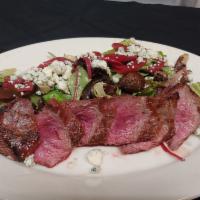 Grilled Steak Salad  · Grilled flank steak on greens with tomato, pickled red onion, balsamic marinated mushrooms, ...