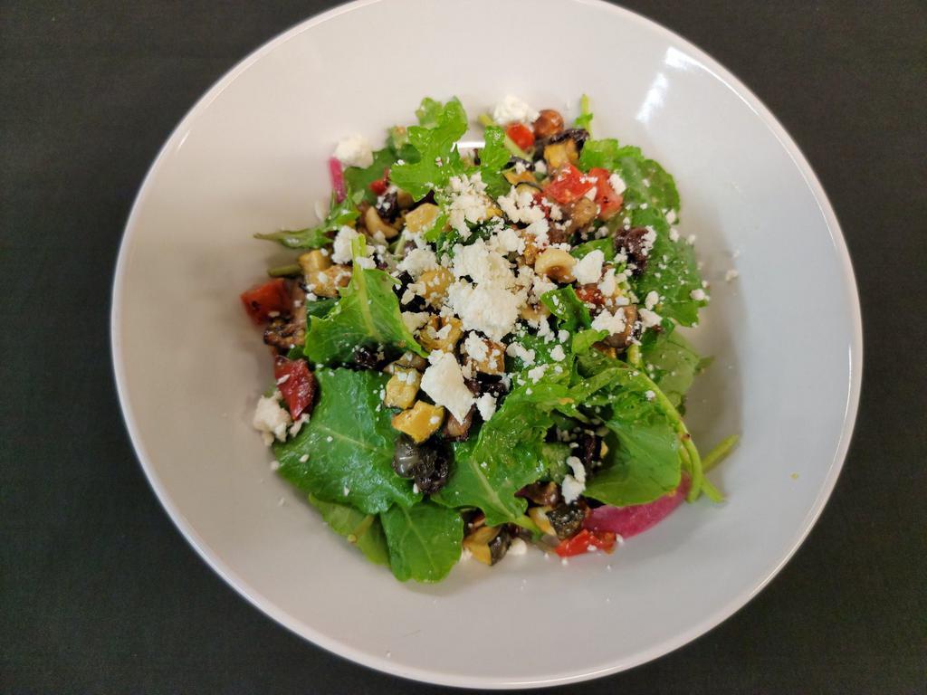 Kale Salad  · Baby kale, goat cheese, toasted hazelnuts, pickled onion, raisins, diced and roasted veggies served with a side of honey house mustard vinaigrette. Add chicken breast for an additional charge.