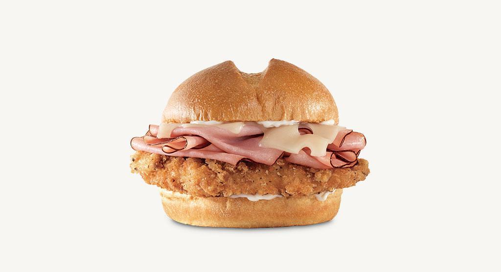 Crispy Buttermilk Chicken Cordon Bleu Sandwich · A crispy buttermilk chicken fillet with thinly sliced pit-smoked ham, Swiss cheese and mayo on a star top bun. Visit arbys.com for nutritional and allergen information.