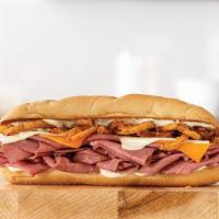 Three Cheese Roast Beef Sandwich · Thinly sliced roast beef with melted cheddar cheese, Swiss cheese, crispy fried onions and a...